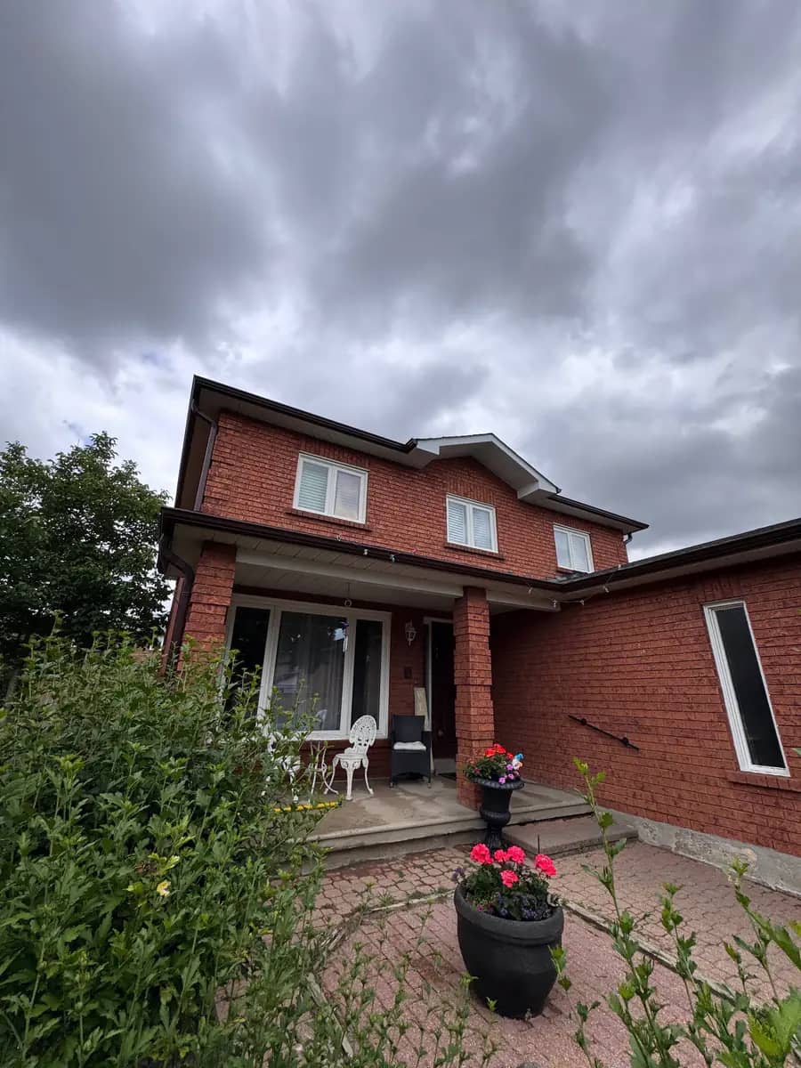Red-brick GTA home after window cleaning, shared by customer AirCan Service on Google